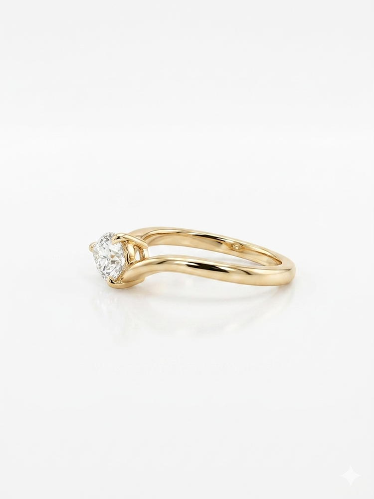 Gold ring with a diamond on a white background