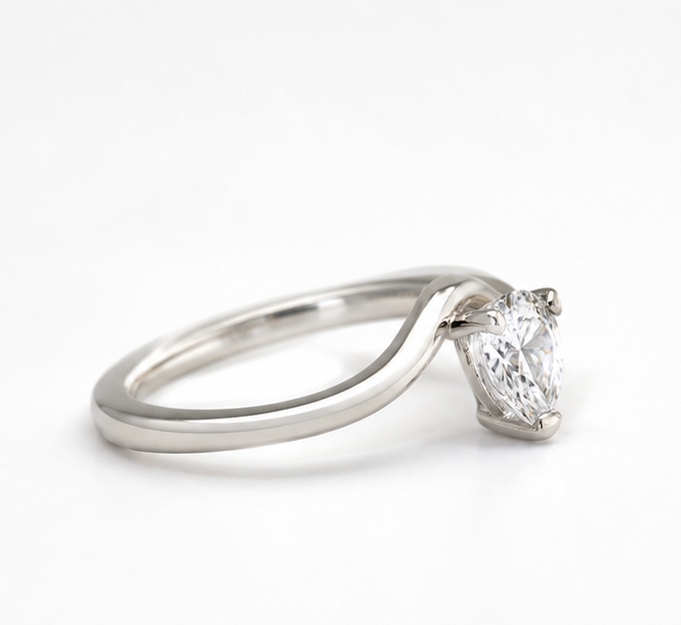 Three silver rings with diamond accents on a white background