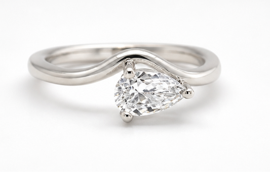 Three silver rings with diamond accents on a white background