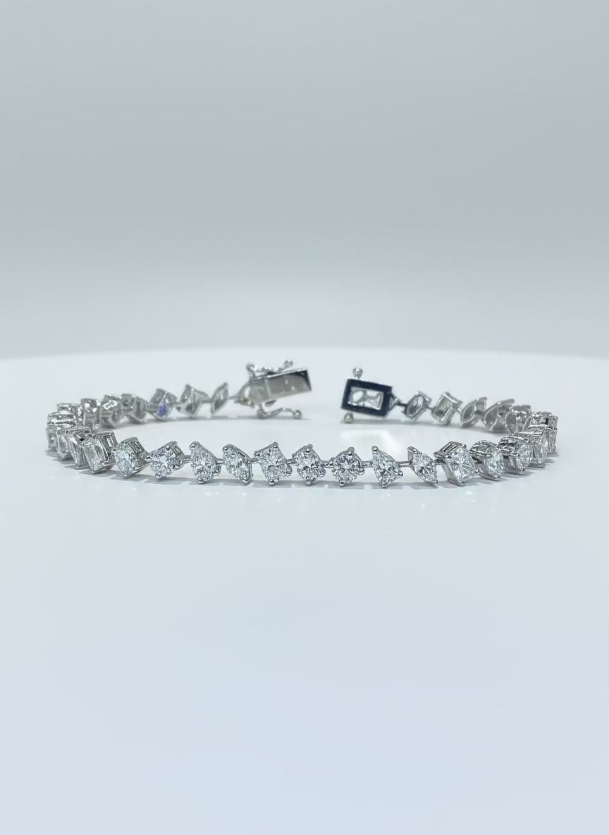 
                    Multi Shaped Tennis Bracelet 6.85
                  