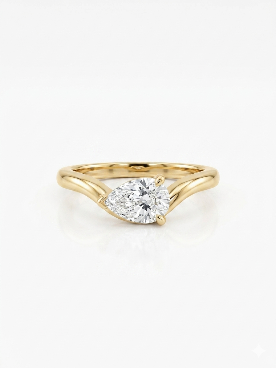 
                    Gold ring with a diamond on a white background
                  